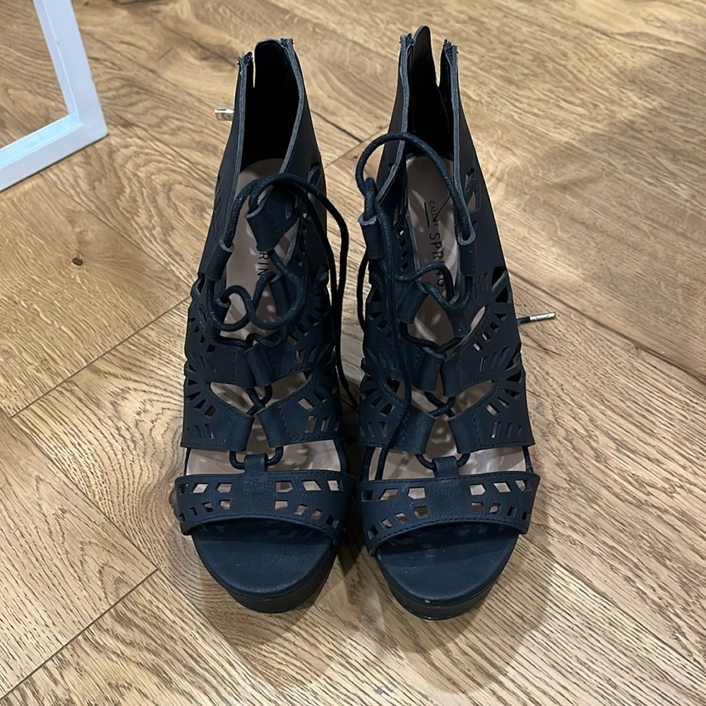 Brand new never worn wedge heel size 7.5